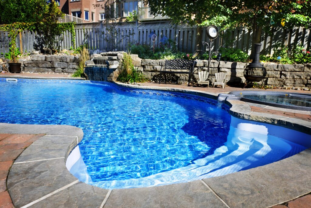 Beyond Square: Beautiful and Bold Freeform Pools swimming pool with waterfall
